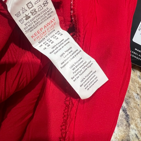 PrettyLittleThing Plus Red Deep-V Textured Wide Leg Jumpsuit 14 - Picture 12 of 15